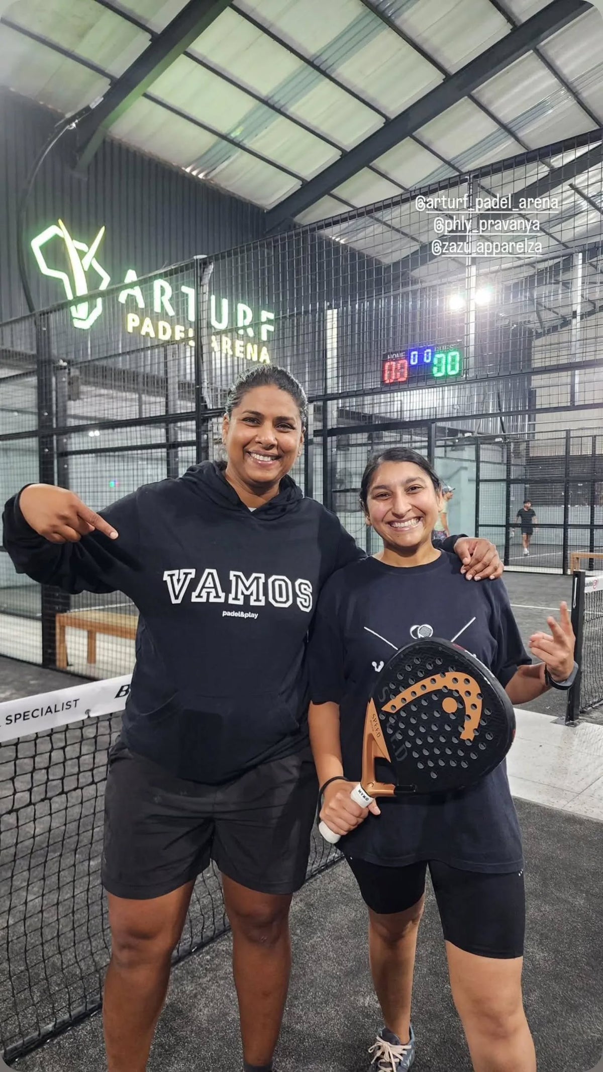 Two players in Zazu Vamos apparel on a padel court